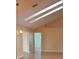 Bright living room with vaulted ceiling, hardwood floors, and an open floor plan at 6548 Sw 84Th Place Rd, Ocala, FL 34476
