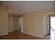 Inviting living area with hardwood floors offering a versatile space for relaxation and entertainment at 6548 Sw 84Th Place Rd, Ocala, FL 34476