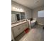 Modern bathroom with a soaking tub, double vanity, and updated fixtures for a spa-like experience at 6884 Sw 149Th Lane Rd, Ocala, FL 34473
