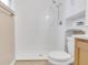 Clean bathroom featuring tiled shower, vanity, and toilet at 811 Niles St, Daytona Beach, FL 32114