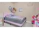 Bright bedroom featuring a cozy bed, soft carpet and decorations at 811 Niles St, Daytona Beach, FL 32114