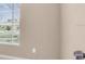 Bedroom interior view showcasing a window, and neutral wall color at 811 Niles St, Daytona Beach, FL 32114