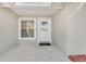 Inviting front entrance with a decorative glass door and sidelight window at 811 Niles St, Daytona Beach, FL 32114