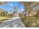 Charming one-story home with a neatly manicured lawn and a paved driveway at 811 Niles St, Daytona Beach, FL 32114