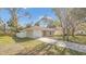 Cozy single-story home featuring a driveway, one car garage, and white fence at 811 Niles St, Daytona Beach, FL 32114