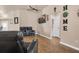 Inviting living room featuring a ceiling fan and a wall-mounted TV at 811 Niles St, Daytona Beach, FL 32114