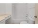 Bright bathroom features a tub and vanity at 8740 Se 140Th Place Rd, Summerfield, FL 34491