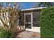 Cozy screened-in porch, ideal for relaxing and enjoying the outdoors at 8740 Se 140Th Place Rd, Summerfield, FL 34491