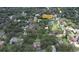An aerial view displays the CampAlto neighborhood, showcasing the lush tree coverage and proximity to 9th and 5th Street at 912 Se 6Th St, Ocala, FL 34471