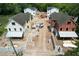 New construction aerial view showcasing multiple homes under construction in a vibrant community at 912 Se 6Th St, Ocala, FL 34471