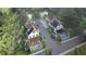 Exterior rendering showing completed homes in CampAlto subdivision with swimming pools and driveways at 912 Se 6Th St, Ocala, FL 34471