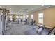 Spacious fitness center equipped with state-of-the-art exercise machines and free weights at 9356 Sw 60Th Court Rd, Ocala, FL 34476