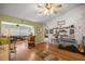 Inviting space with hardwood floors, plenty of seating and natural light at 9710 Sw 96Th St, Ocala, FL 34481