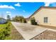 View of the long driveway leading to the home, highlighting mature trees and manicured landscaping at 11267 Sw 51St Ave, Ocala, FL 34476