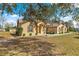 Charming single-story home with a well-maintained lawn and mature landscaping at 11267 Sw 51St Ave, Ocala, FL 34476