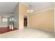 Open-concept living area adjacent to the dining room and kitchen at 11267 Sw 51St Ave, Ocala, FL 34476