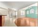 Living room area with hardwood floors, and access to the outdoor patio at 11267 Sw 51St Ave, Ocala, FL 34476