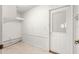 Mud room with tile floors, utility connections, and exterior door at 11267 Sw 51St Ave, Ocala, FL 34476