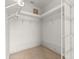 Walk-in closet with shelving and organization system for optimal storage at 11267 Sw 51St Ave, Ocala, FL 34476