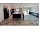 Bathroom featuring a double vanity, garden tub, and a large mirror with modern lighting at 11644 Nw 21St St, Ocala, FL 34482