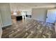 Modern kitchen featuring a large island with seating, stainless steel appliances, and updated cabinets at 11644 Nw 21St St, Ocala, FL 34482