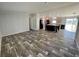 Modern kitchen featuring a large island with seating, stainless steel appliances, and updated cabinets at 11644 Nw 21St St, Ocala, FL 34482