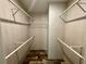 Walk-in closet with shelving and rod, offering lots of storage options at 11644 Nw 21St St, Ocala, FL 34482