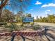 Entrance to Lakeview Woods community with attractive landscaping around the decorative sign at 1192 Ne 130Th Ter, Silver Springs, FL 34488