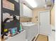 Convenient laundry room with a washing machine and dryer at 1192 Ne 130Th Ter, Silver Springs, FL 34488