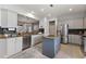 Modern kitchen with granite countertops, stainless steel appliances, and a central island at 12139 Se 91St Ter, Summerfield, FL 34491
