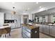 Bright, updated kitchen with a center island, sleek appliances, and ample cabinet space at 12139 Se 91St Ter, Summerfield, FL 34491