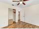 Another view of this Comfortable bedroom with wood-look floors, closet, and ceiling fan at 1505 Ne 33Rd Pl, Ocala, FL 34479