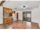 An open-concept Living Room flows seamlessly into the updated kitchen and dining area, perfect for entertaining at 1505 Ne 33Rd Pl, Ocala, FL 34479