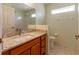 Bathroom vanity featuring granite countertop and a toilet at 15304 Sw 15Th Terrace Rd, Ocala, FL 34473