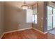 Bright breakfast nook with large window and modern light fixture at 15304 Sw 15Th Terrace Rd, Ocala, FL 34473