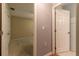 Hallway view into bedroom with an open door at 15304 Sw 15Th Terrace Rd, Ocala, FL 34473