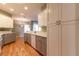 Spacious kitchen offers ample storage, modern appliances, and hardwood flooring at 15304 Sw 15Th Terrace Rd, Ocala, FL 34473