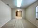 Bedroom with neutral colored walls and carpet at 15702 Sw 16Th Avenue Rd, Ocala, FL 34473