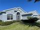 Charming single-story home with a well-maintained lawn and beautiful landscaping at 15702 Sw 16Th Avenue Rd, Ocala, FL 34473
