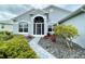 Charming single-story home featuring a well-maintained front yard, rock landscaping and walkway at 15702 Sw 16Th Avenue Rd, Ocala, FL 34473