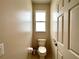This toilet room has a window for natural light at 15702 Sw 16Th Avenue Rd, Ocala, FL 34473