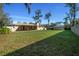 Spacious backyard with mature trees, a storage shed, and plenty of room for outdoor activities at 1732 Se 38Th Ct, Ocala, FL 34471