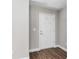 A clean, bright entryway with wood floors and a white front door at 2 Hemlock Ter Dr, Ocala, FL 34472