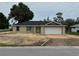 Charming single-story home with a two-car garage and a newly constructed driveway at 2 Hemlock Ter Dr, Ocala, FL 34472
