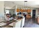 Spacious dining room with hardwood floors, and an open floor plan to kitchen at 2061 Nw 165Th Court Rd, Dunnellon, FL 34432