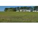 Land with a home, horses, and mature trees, offering a serene country living experience and ample space at 2061 Nw 165Th Court Rd, Dunnellon, FL 34432