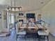 Combined living and dining room with hardwood floors and an electric fireplace at 2061 Nw 165Th Court Rd, Dunnellon, FL 34432