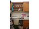 Functional office space with built-in wooden cabinets and a comfortable chair for productivity at 2061 Nw 165Th Court Rd, Dunnellon, FL 34432