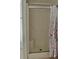 Shower enclosure with a built-in seat and sliding doors, with a shower curtain in the bathroom at 2061 Nw 165Th Court Rd, Dunnellon, FL 34432