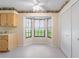 Bright breakfast nook with a bay window and a closet for extra storage at 22 Banyan Dr, Ocala, FL 34472